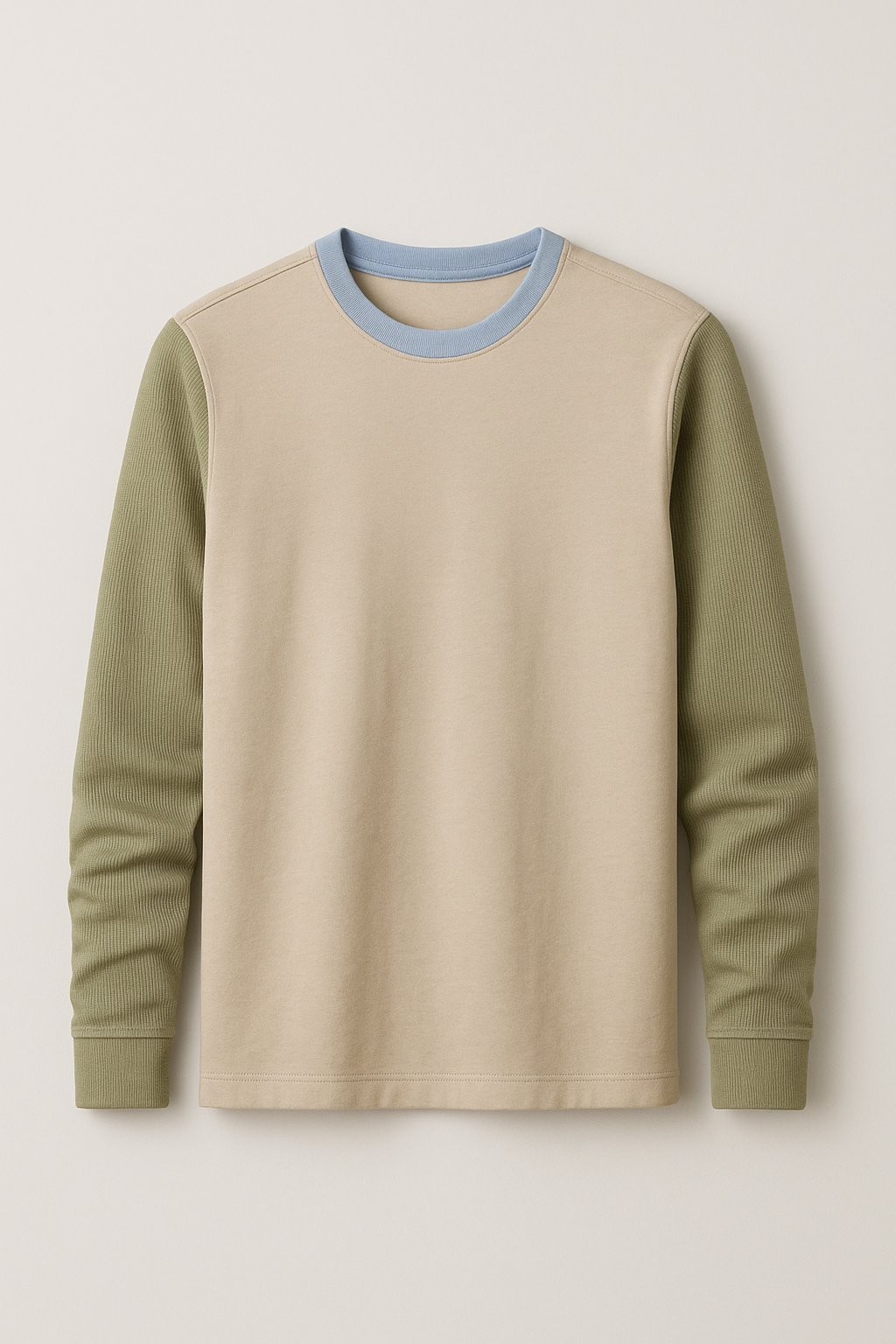 یک تیشرت آستین بلند مردانه/زنانه با طراحی مدرن و ترند، مناسب افراد ۲۰ تا ۴۰ ساله، دارای برش فیت و زیبا، رنگ‌های ترندی مانند بژ، آبی آسمانی، سبز زیتونی، خاکستری، یا یاسی ملایم. جنس پارچه نرم و باکیفیت مانند پنبه ارگانیک یا ترکیب پنبه و اسپندکس. طراحی ساده اما شیک، بدون لوگوی بزرگ، ترجیحاً با جزئیات مینیمال (مثل دوخت تزئینی یا بافت خاص در آستین). پس‌زمینه ساده و نورپردازی استودیویی حرفه‌ای.